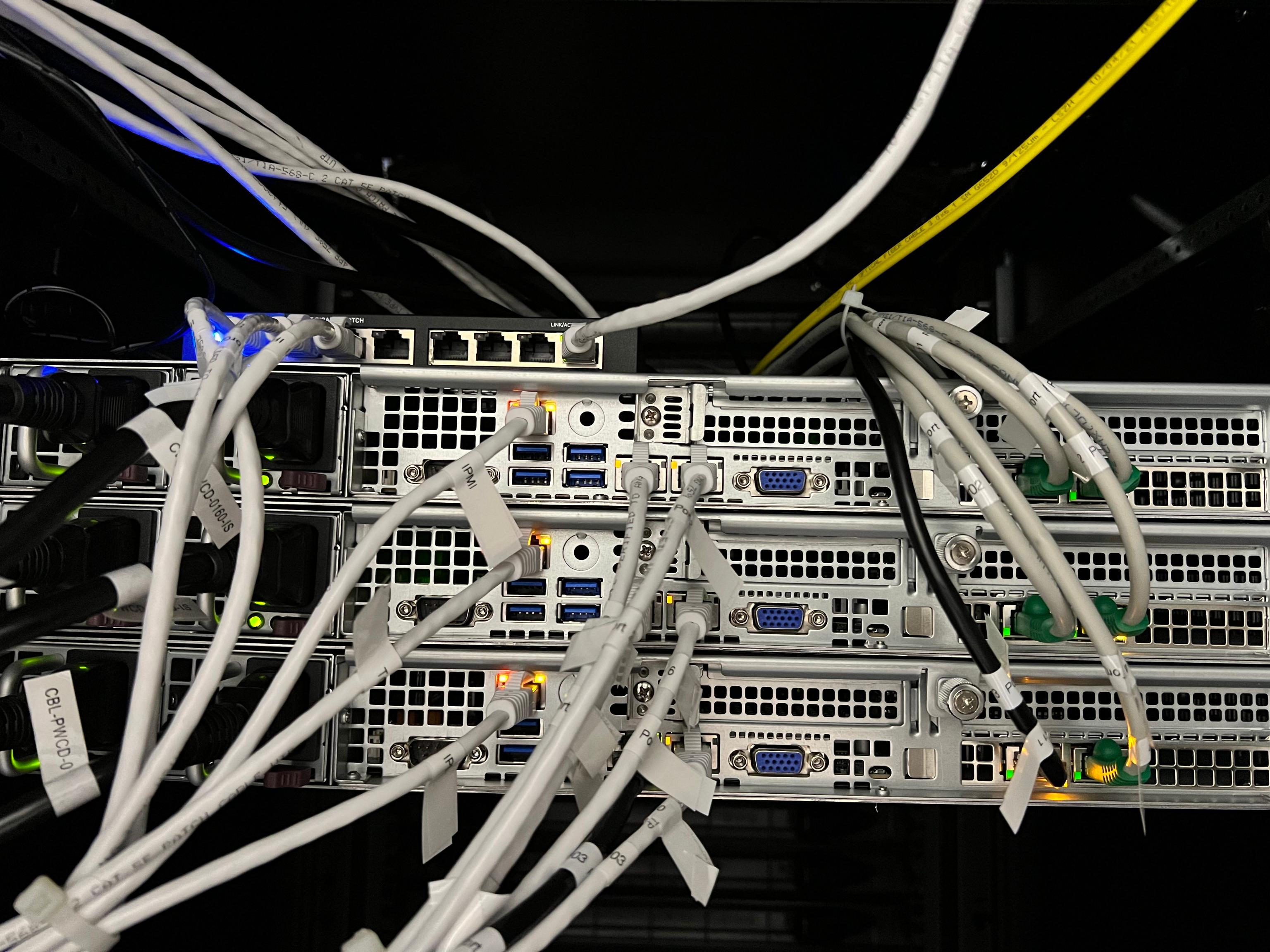 Back of the setup, where we see the extra management switch